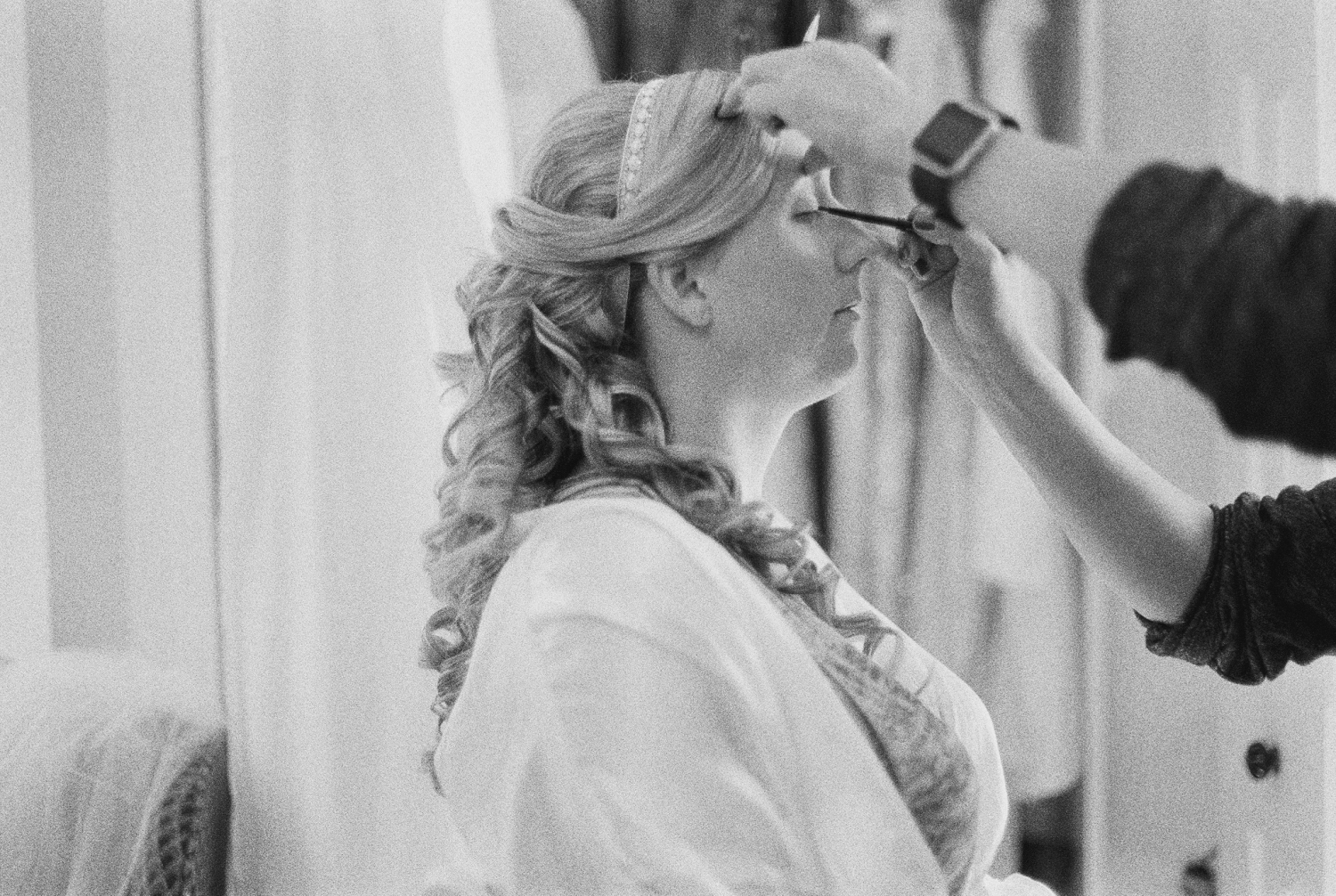 Bride getting ready pictures, bride doing makeup