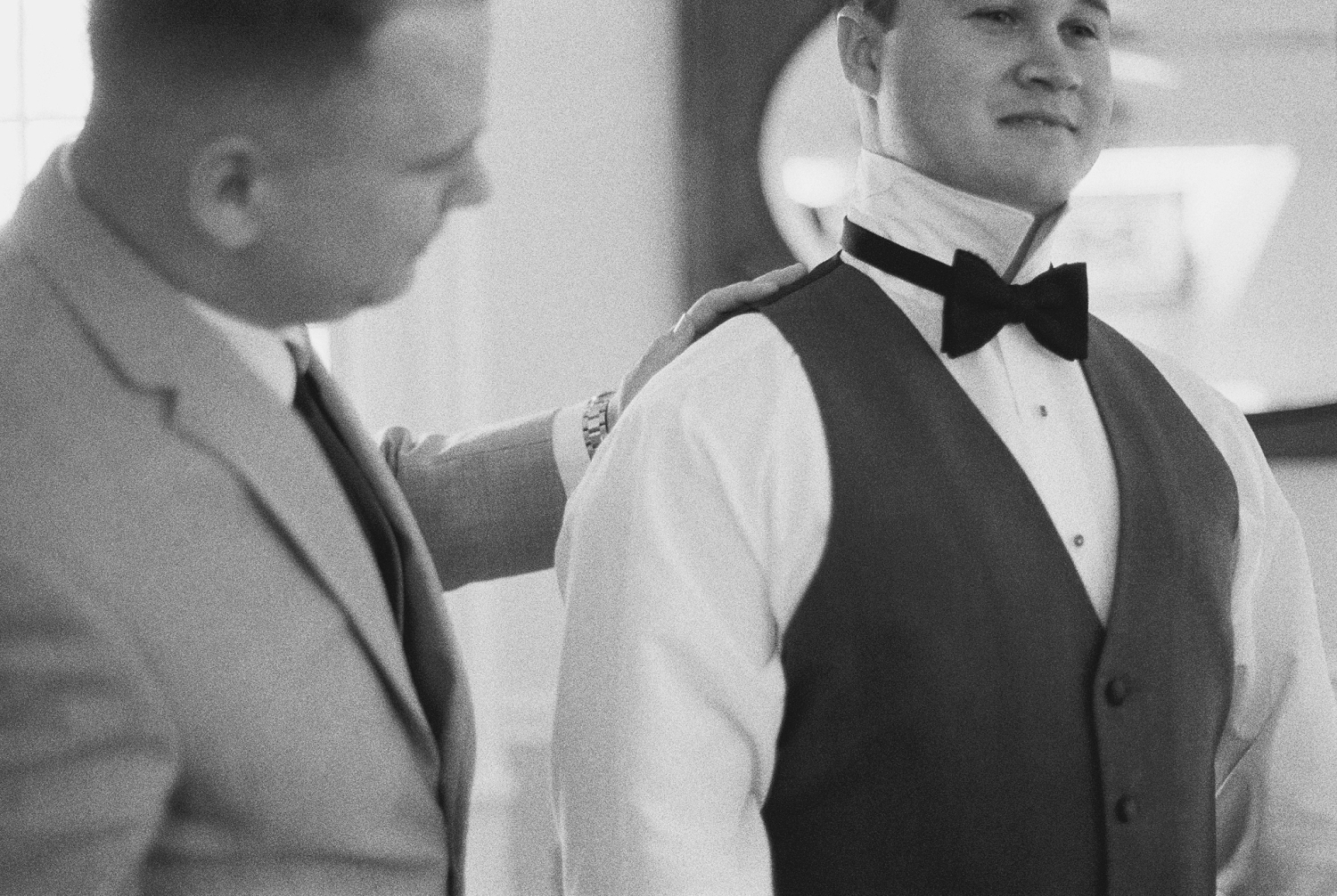 Groom getting ready , classy groom, groom in black and white