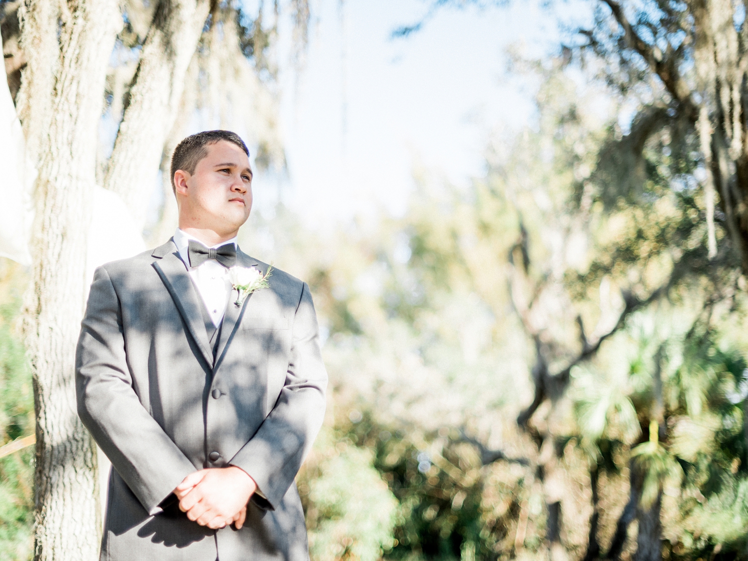groom waiting at the alter at up the creek farms
