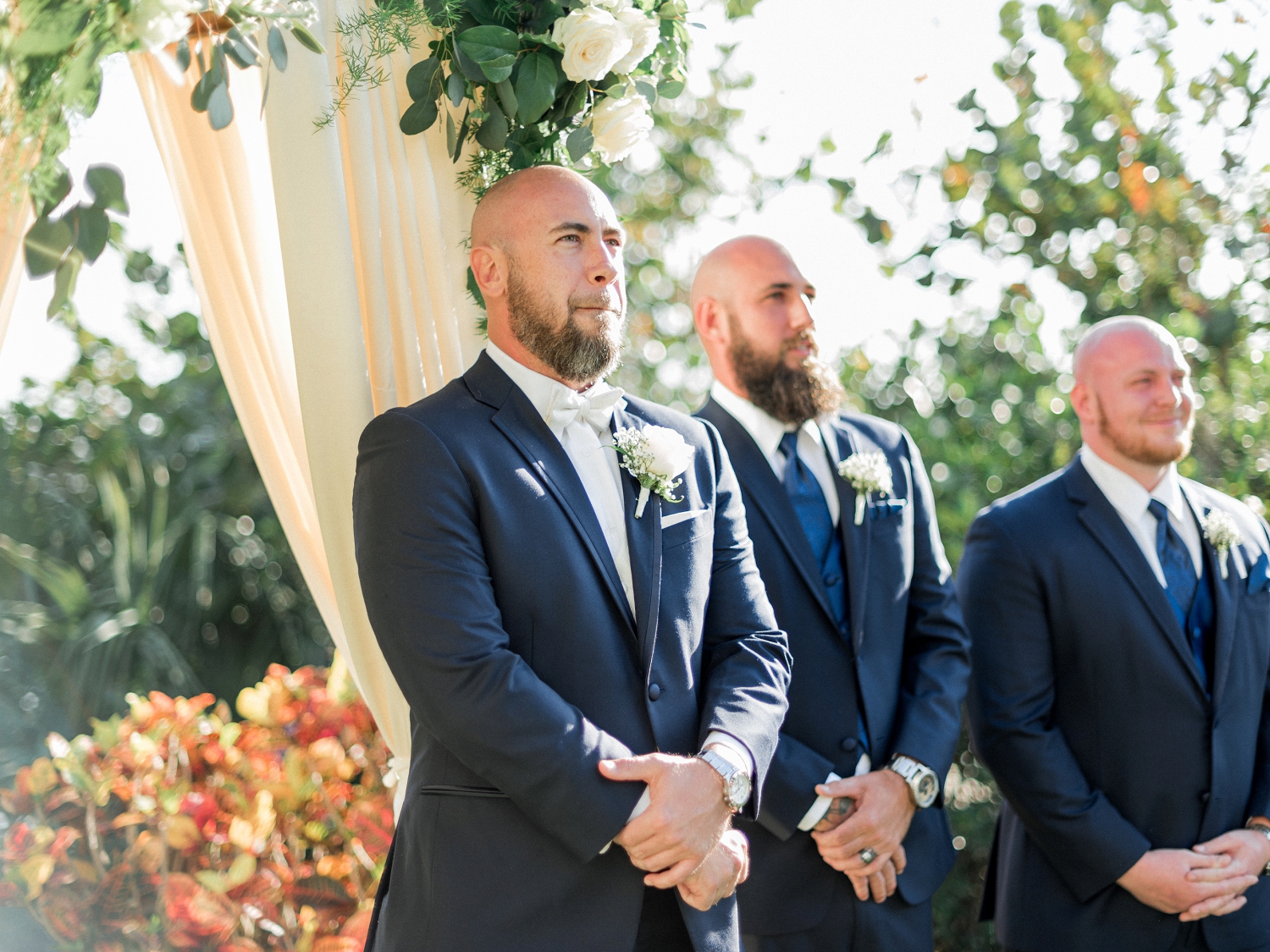grooms reaction, groom during ceremony, seeing the bride for the first time