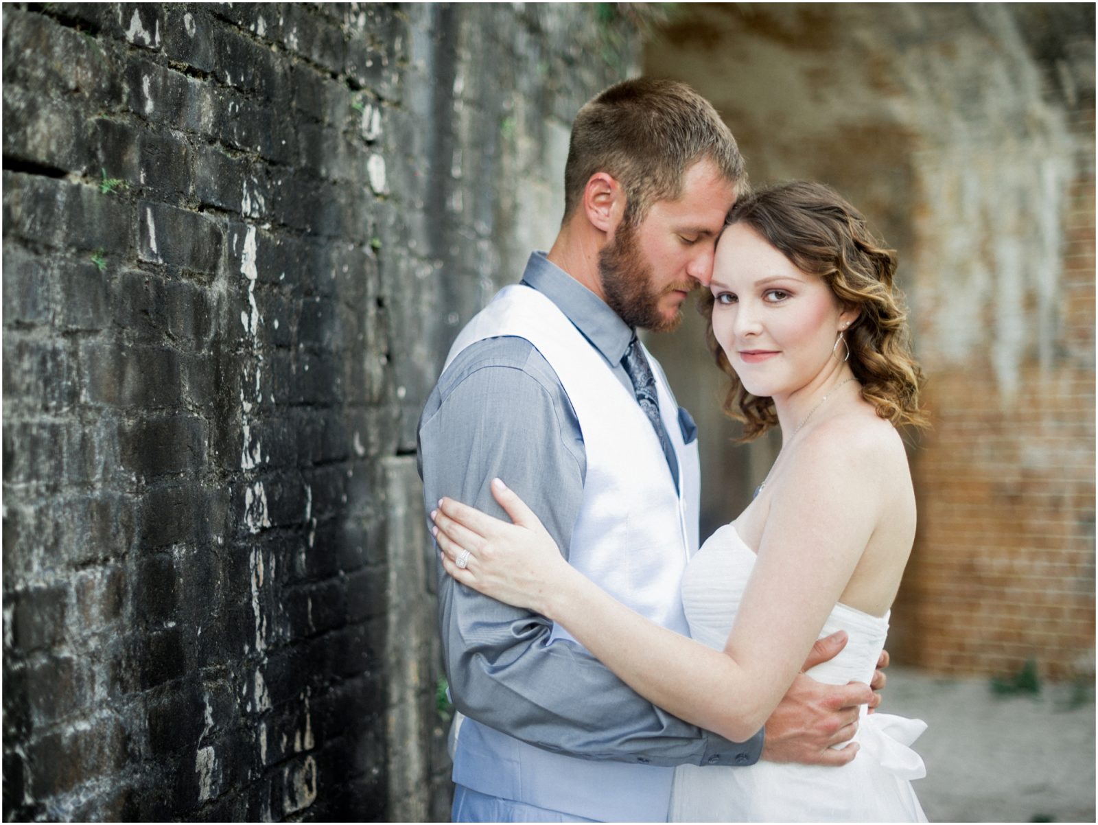 bride and groom in fort pickens pensacola