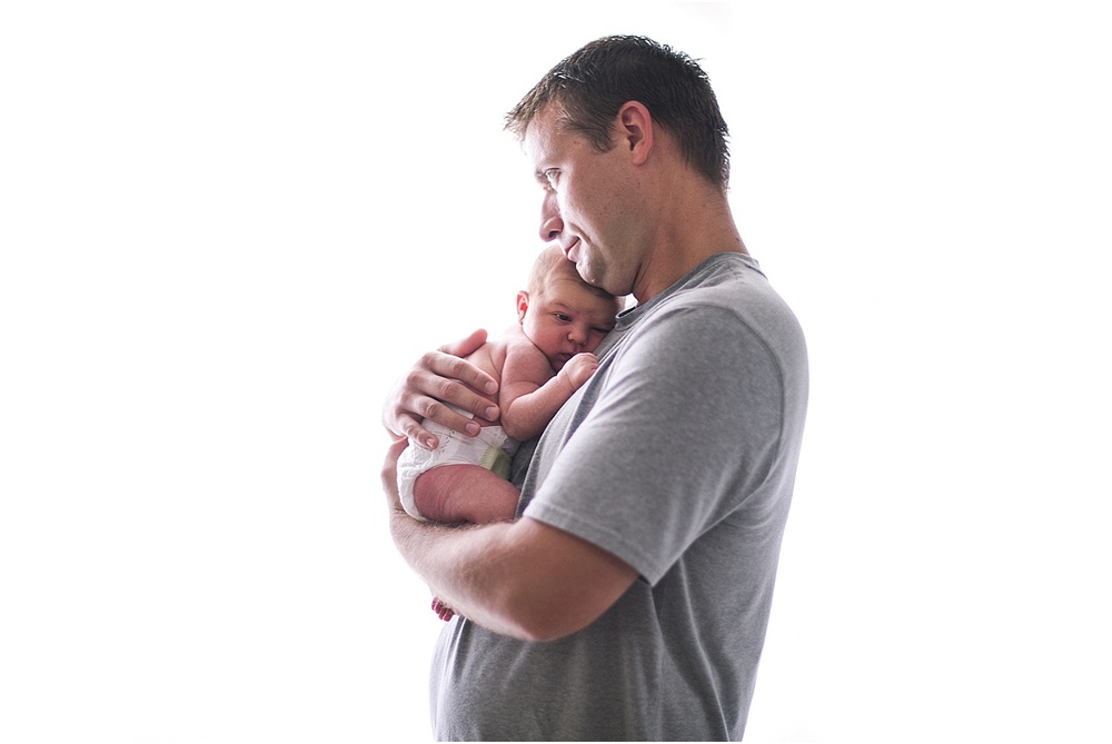 must have newborn portraits, daddy and baby