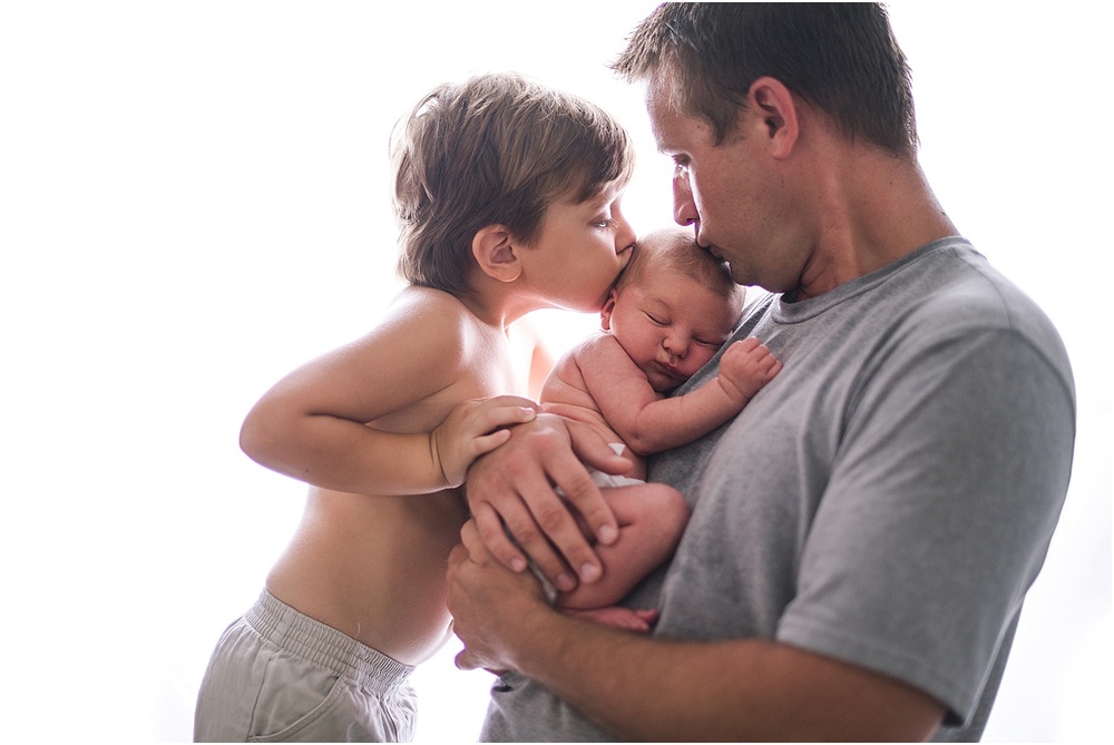 daddy and brother with baby girl, Okeechobee Newborn Photographer